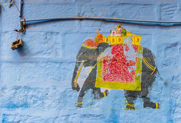 Wall Mural - Elephant murial on blue wall in Jodhpur, Rajasthan