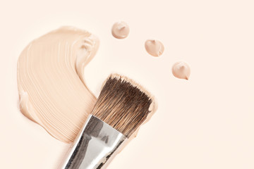 Poster - Cosmetic foundation cream and powder with brush