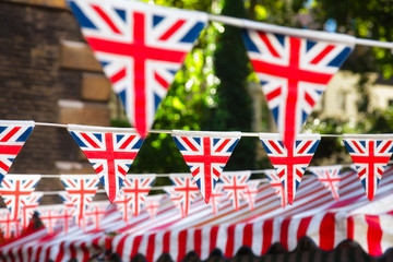 strings of union jack bunts festive decoration in london england uk