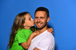 © be free - Childhood and family relationship concept. Daughter kisses her daddy