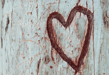 Photo Of Old Tree Trunk With Heart Carved On It. Valentine's Day Concept. Romantic Background.
