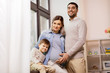 © Syda Productions - happy family with pregnant mother at home