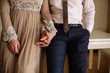 © boykovi1991 - Groom and brides hands with rings, closeup view