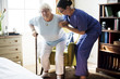 © Rawpixel.com - Nurse helping senior woman to stand