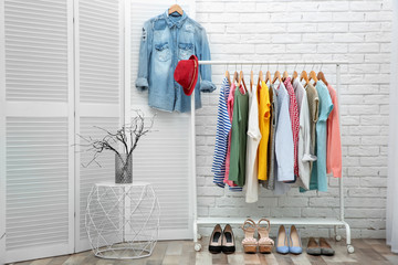 Wall Mural - Neat dressing room interior with clothes rack