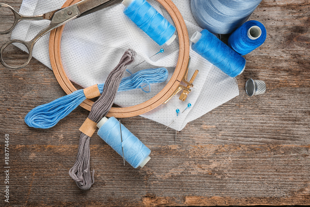 Threads and other accessories for sewing and embroidery on table