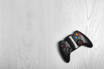 Canvas Print - Video game controller on light background