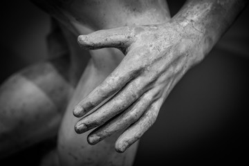 stone statue detail of human hand