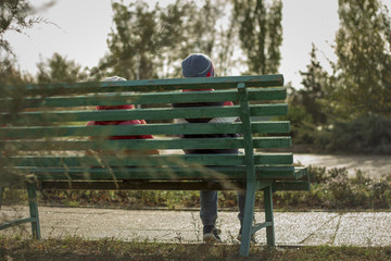 Little the brother with the sister on a bench