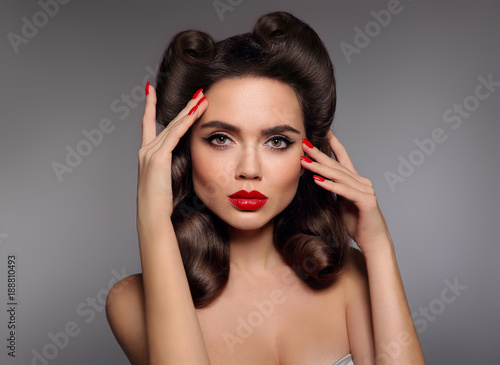 Pin Up Girl With Red Lips Makeup Manicure Nails And Retro Curls