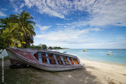 Barque Couochée Sur La Plage De Trou Aux Biches île Maurice