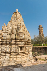 Canvas Print - Samadhisvar Temple in Front of Vijaya Stambha Tower in Chittorgarh, Rajasthan