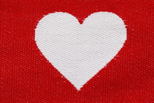 Embroidered White Heart On A Red Background