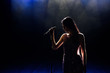 © nagaets - Singer woman on stage