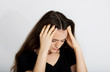 © agnieszka_marcinska - Portrait of stressed and depressed teen holding her head.