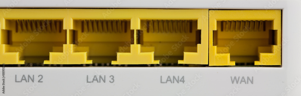 Closeup back of wifi router LAN and WAN ports. There are two PSTN ports ...
