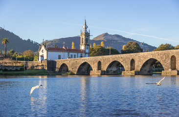 Sticker - Roman bridge in Ponte de Lima town, Portugal - view with Santo Antonio da Torre Velha church