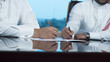 © Hany - Two Saudi Businessmen Hands Signing A Ducument
