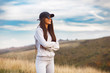 © djile - Women smiling in sports clothes and sunglasses pose in nature