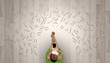 © ra2 studio - Letters with woman using laptop in a chair
