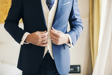 Close-up Of A Man Wearing A Smart Suit
