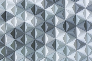 Wall Mural - background, modern style, texture concept. backdrop of the theater created in futuristic style of pyramids made of constuction paper in different shades of grey colour