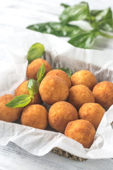 Wall Mural - Rustic bowl of arancini