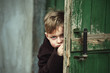 © fisher05 - funny boy peeking out from behind the door