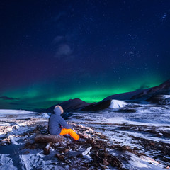 Wall Mural - the polar arctic northern lights aurora borealis sky star in norway svalbard in longyearbyen city to