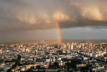 View Of Paris From Above. Rain, Clouds, Rainbow.