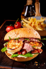 Wall Mural - Gourmet Surf and Turf seafood and meat burger