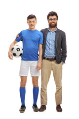 Wall Mural - Teenage soccer player with his father