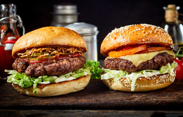 Wall Mural - Tasty fresh meat burgers on wooden board