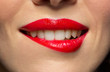 © Syda Productions - close up of woman with red lipstick biting lip