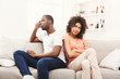 © Prostock-studio - Young black couple quarreling at home