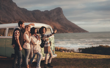 Wall Mural - Friends on roadtrip together taking a selfie