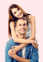 Portrait of young happy hugging couple