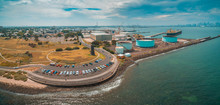 Aerial Panoramic View Of Parking Lot And Industrial Wharfs Near Ocean Coastline At Williamstown Suburb Of Melbourne, Australia