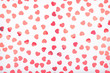 Background with glitter heart confetti. Valentine day concept. Trendy minimalistic flat lay design background