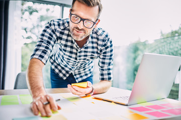 Wall Mural - Handsome man planning new business