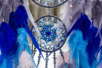 Wall Mural - Handmade dream catcher with feathers threads and beads rope hanging