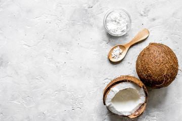 cosmetic concept with fresh coconuts on stone table background t