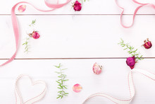 Two Ribbon Magic Pink Hearts On White Wooden Backround, Roses And Petals. Valentine Day Concept