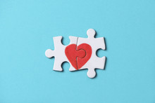 Pieces Of A Puzzle Forming A Heart