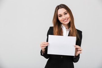 Sticker - Portrait of an attractive businesswoman dressed in suit