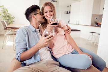 Sticker - Young couple drinking wine.