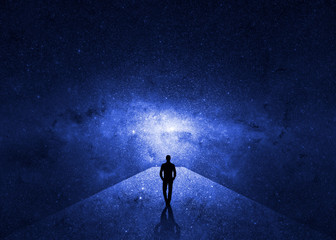 Wall Mural - man walking through the universe