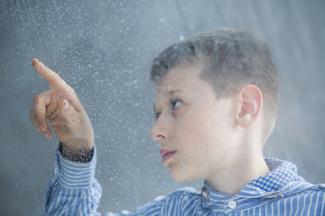 Wall Mural - Autistic child counting raindrops