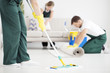 © Photographee.eu - Cleaner cleaning floor using mop
