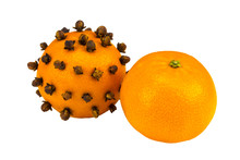 Aromatic Christmas Orange With Cloves On White Background